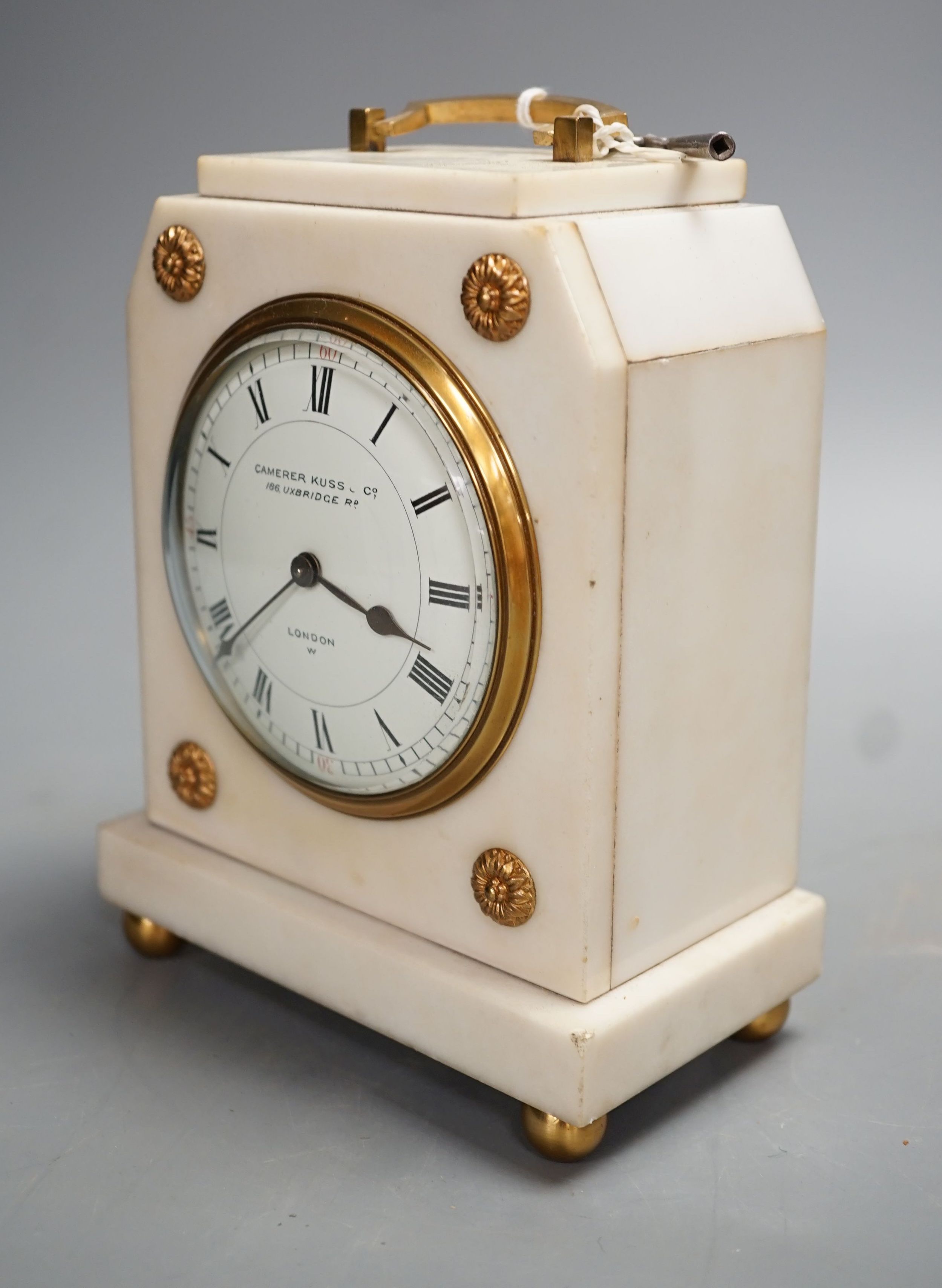 A Camerer Kuss marble and ormolu mantel clock, lion mark to movement with key, 18cm tall